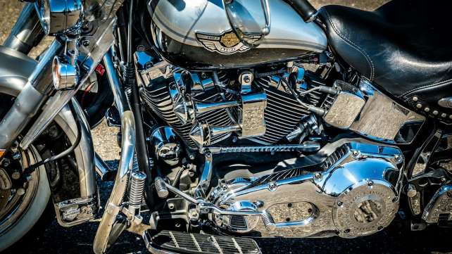 a close up of a motorcycle parked on a street