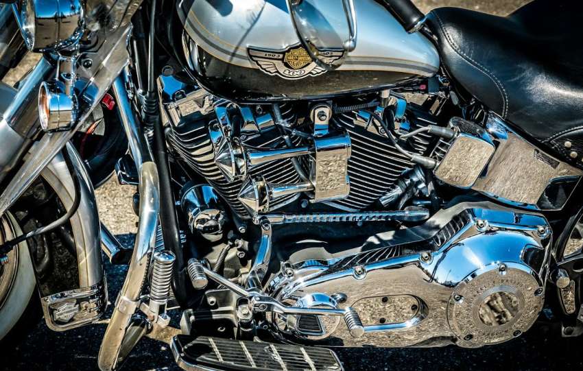 a close up of a motorcycle parked on a street
