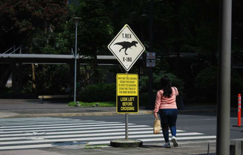 a couple of people that are standing in the street